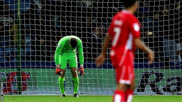 Bristol City players look dejected after conceding the second goal