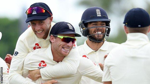 England celebrate led by Joe Root and Jos Buttler