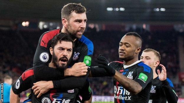 James McArthur and James Tomkins celebrate a Crystal Palace goal