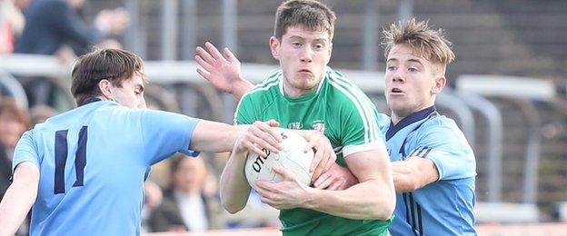 Killyclogher pair Conall McCann and Mark Bradley close in on Cargin's John Carron in the Omagh encounter