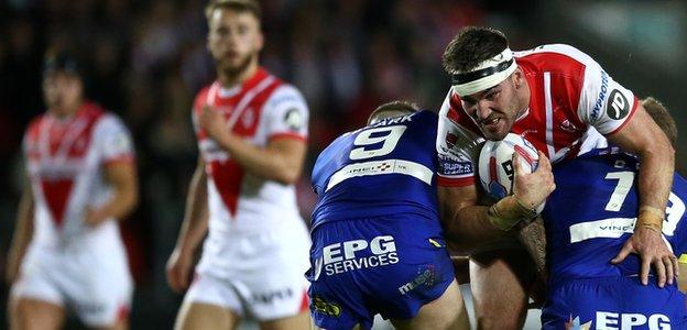 St Helens' Luke Douglas is tackled