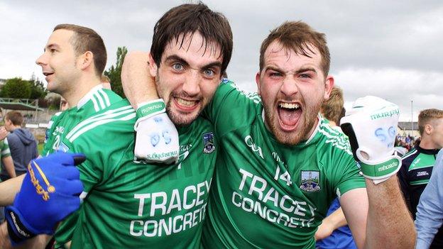 Marty O'Brien and Sean Quigley celebrate after Fermanagh's comeback win over Roscommon