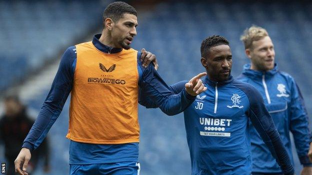 Leon Balogun, Jermain Defoe and Scott Arfield