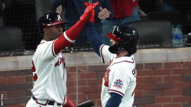 Atlanta Braves' Jorge Soler and Dansby Swanson