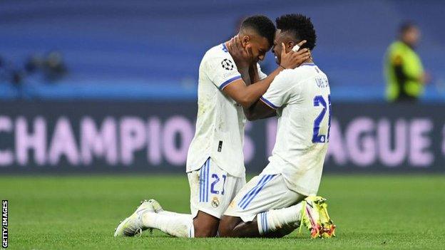 Rodrygo celebrates with Vinicius Junior