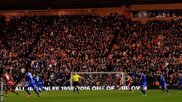 Middlesbrough hold their mobile phones in tribute to Ali Brownlee