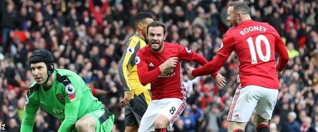 Mata celebrates scoring against Arsenal