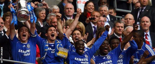 John Terry celebrates winning the FA Cup with Chelsea team mates in 2009