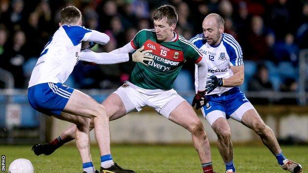 Mayo's Cillian O'Connor in action against Fintan Kelly and Gavin Doogan