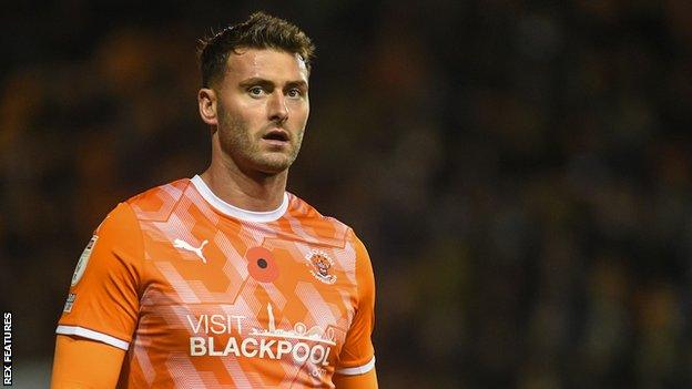 Gary Madine played in the 2021 League One play-off final which saw Blackpool promoted to the Championship