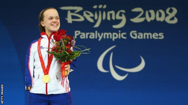 Ellie Simmonds on the medal podium in Beijing