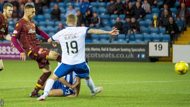 Motherwell's Louis Moult prods the ball home