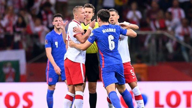 Kamil Glik and Harry Maguire