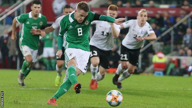 Steven Davis converts a penalty against Estonia in 2019 to net one of his 12 goals for Northern Ireland