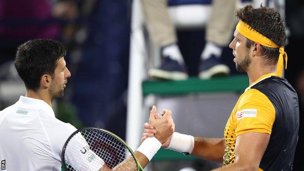 Novak Djokovic and Jiri Vesely