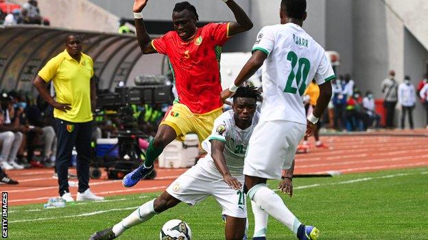 Action in the match between Senegal and Guinea