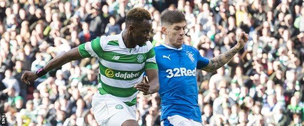 Moussa Dembele gets the better of Rangers defender Rob Kiernan at Hampden