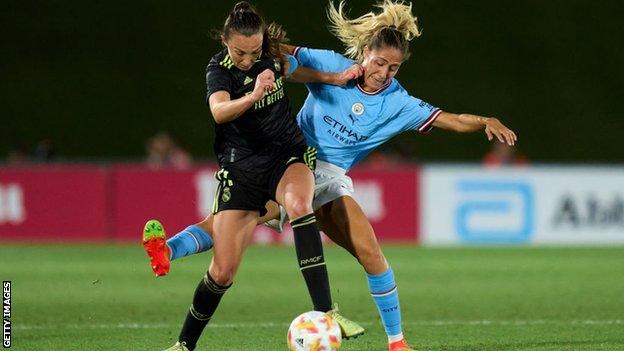 Real Madrid's Caroline Weir tussles with Man City's Laia Aleixandri