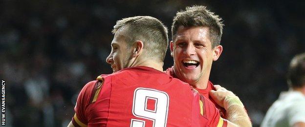 Gareth Davies and Lloyd Williams celebrate as Wales beat England at the 2015 World Cup