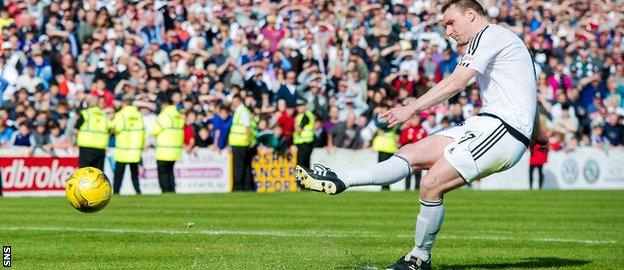 Ayr's Andy Graham scores his penalty