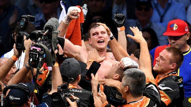 Jeff Horn celebrates winning the world title