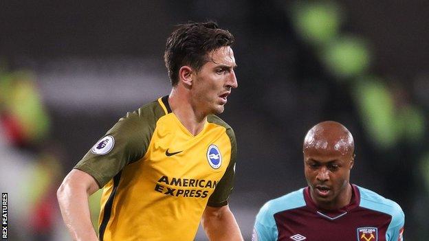 Lewis Dunk (left)