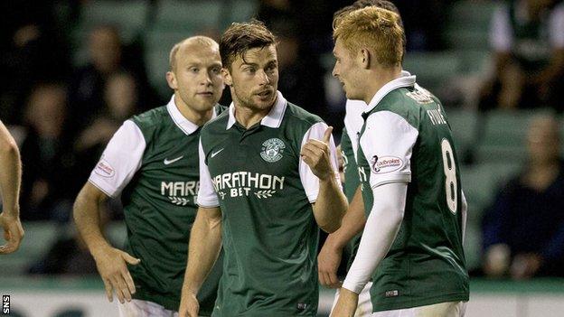 Hibernian's Fraser Fyvie (right) is congratulated by team-mate Lewis Stevenson after his cross is turned into the net by Stranraer's Scott Rumsby