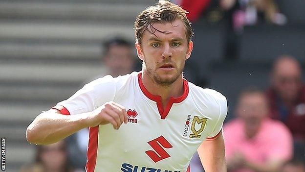 Alex Gilbey in action for MK Dons