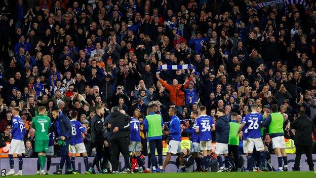 Oldham fans celebrate