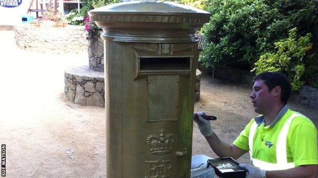 Sark's only postbox being painted gold to mark Carl Hester's Olympic success in Team GB's dressage