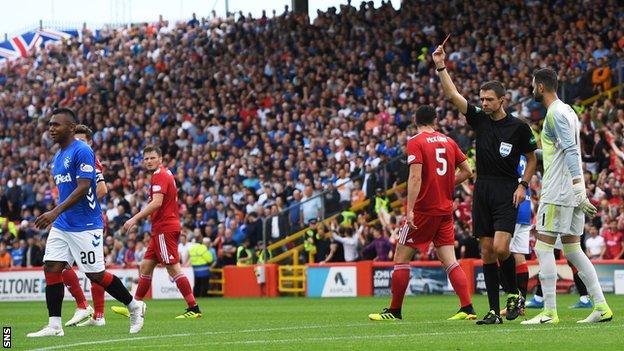 Morelos was sent off after kicking out at Aberdeen defender Scott McKenna