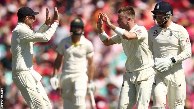 Mason Crane celebrates removing Usman Khawaja for 171 for his first Test wicket