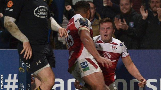 Jacob Stockdale celebrates the opening try with Charles Piutau