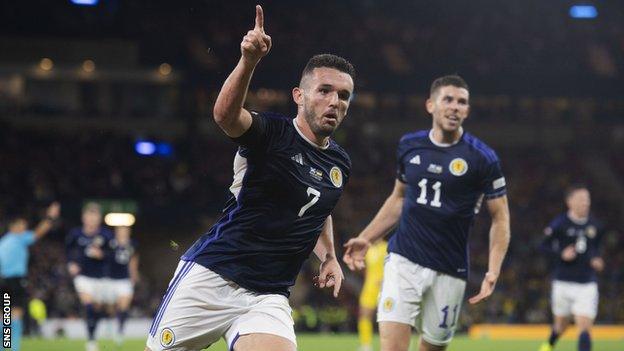 John McGinn celebrates scoring for Scotland at Hampden