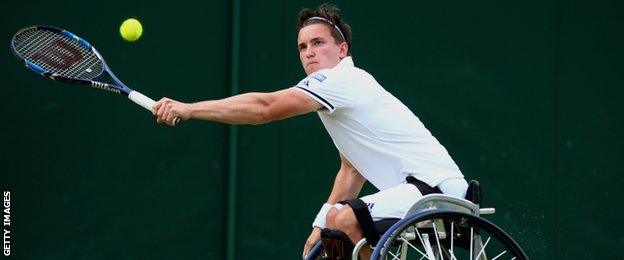 Gordon Reid plays a backhand during his victory against Nicolas Peifer