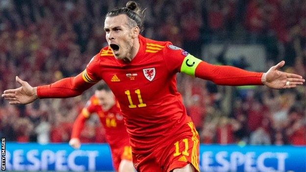 Gareth Bale celebrates scoring against Austria