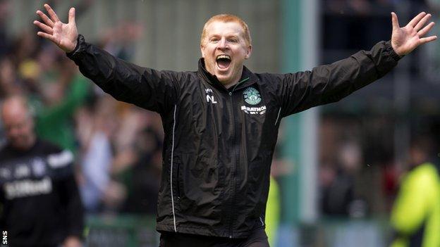 Neil Lennon celebrates Hibernian's equaliser in their draw with Rangers