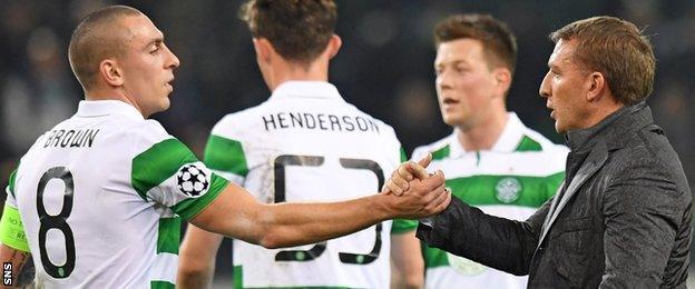 Celtic's Scott Brown and Brendan Rodgers shake hands