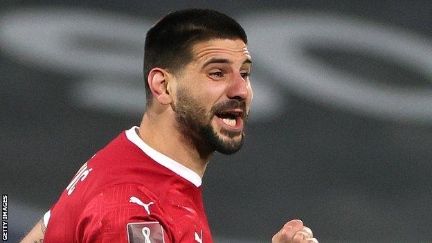 Substitute Aleksandar Mitrovic scored twice for Serbia in the second half