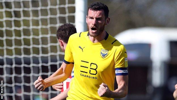 Elliott Moore celebrates scoring for Oxford