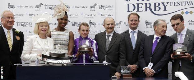 Ryan Moore (centre in purple) with the Oaks trophy