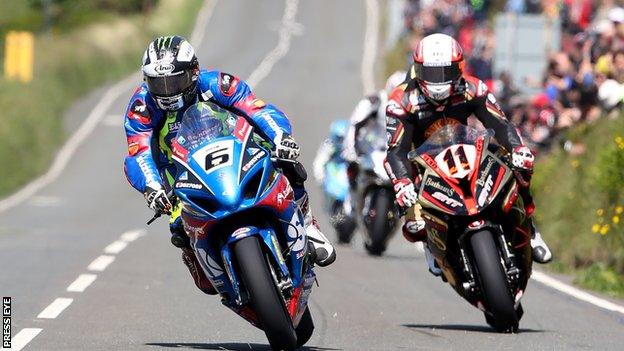 Michael Dunlop (left) in action in Superbike practice on the Isle of Man on Saturday