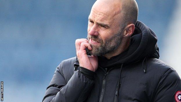 Rotherham manager Paul Warne looks frustrated