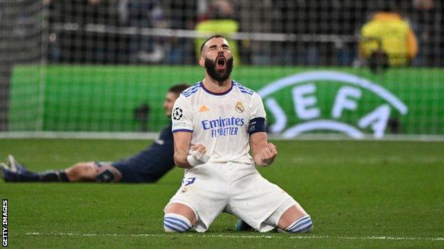 Karim Benzema celebrates his hat-trick against PSG