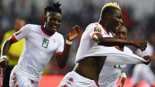 Aristide Bance (right) wheels away in delight after scoring the opener