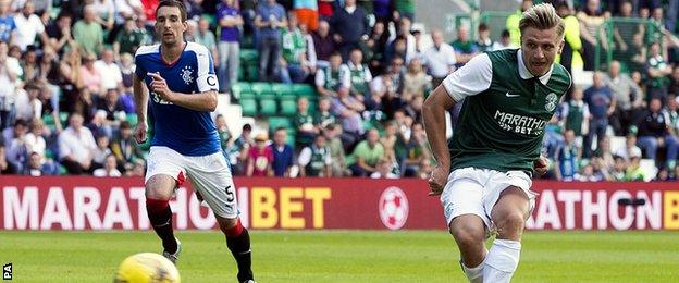 Jason Cummings scores for Hibernian against Rangers