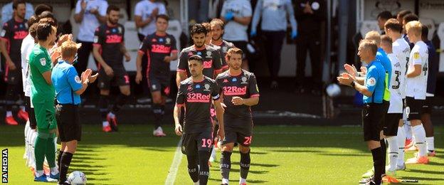 Derby players give Leeds guard of honour