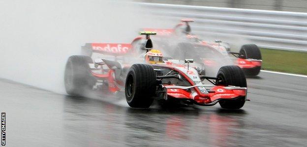 Lewis Hamilton drives through the wet conditions on his way to winning the 2007 Japanese Formula 1 Grand Prix at the Fuji Speedway