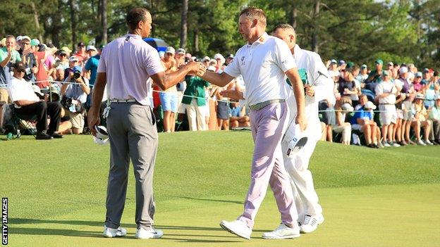 Ian Poulter and Tiger Woods during the third round of the 2019 Masters at Augusta