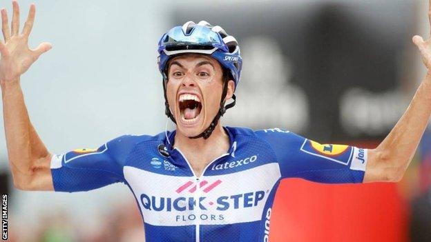 Enric Mas celebrates winning stage 20